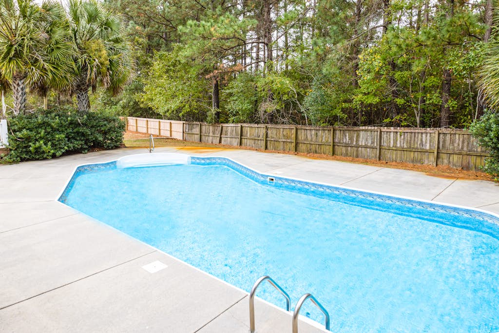Exquisite home with pool, enclosed yard, fireplace, central AC, & washer/dryer