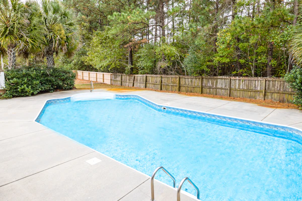 Exquisite home with pool, enclosed yard, fireplace, central AC, & washer/dryer