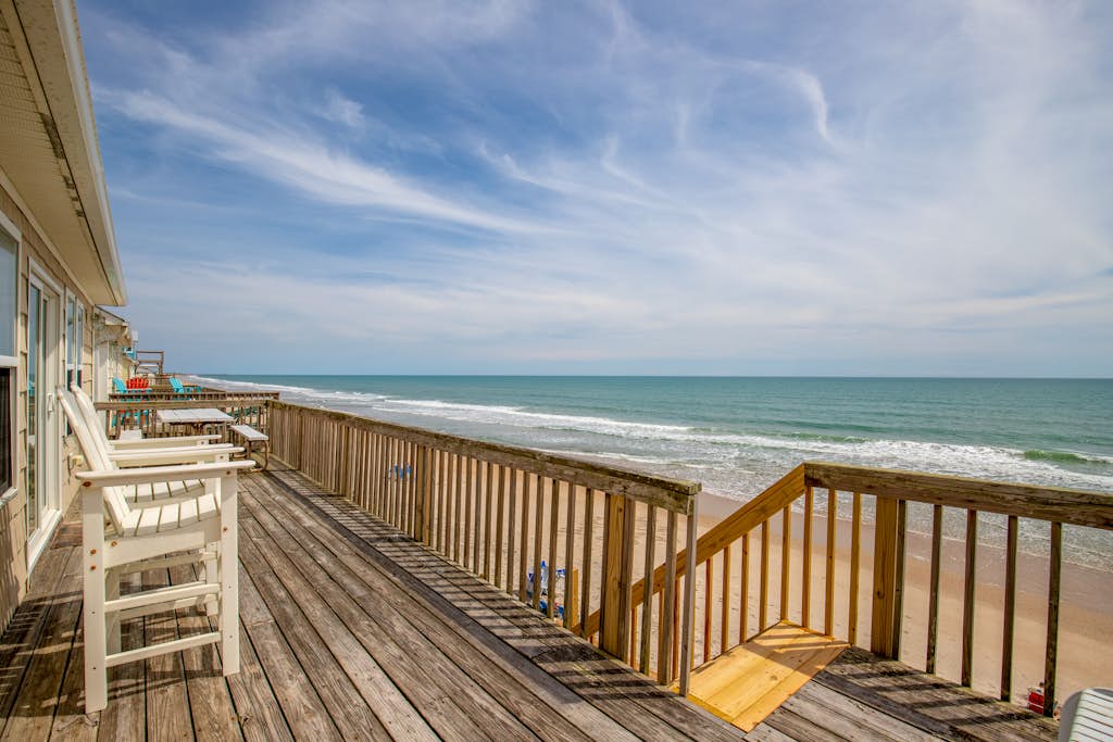 Beachfront home with ocean views, private beach access, elevator, & jetted tub
