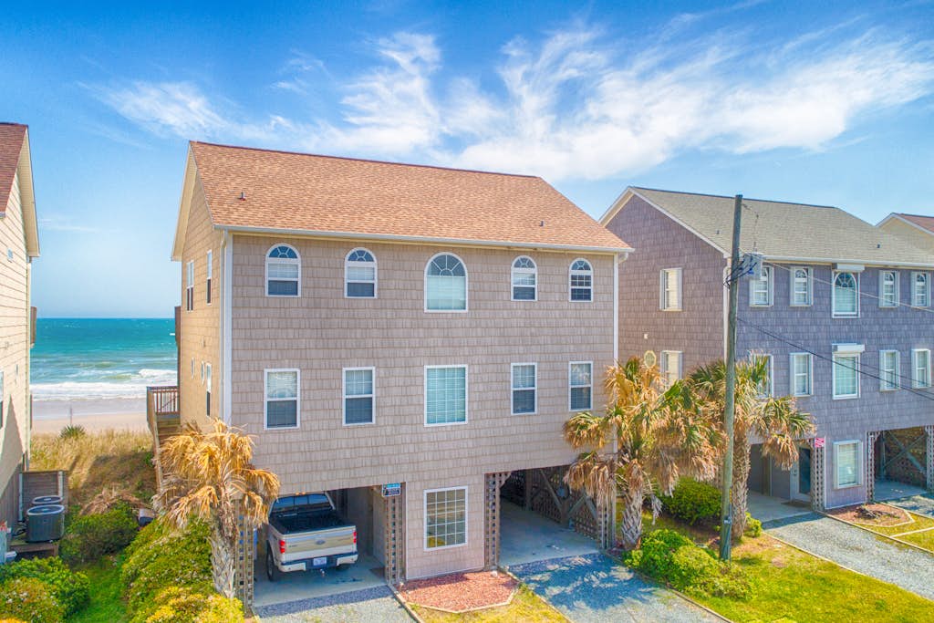 Beachfront home with ocean views, private beach access, elevator, & jetted tub