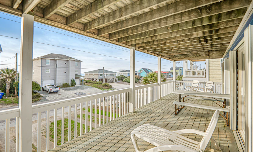 Second-row beach home with ocean views & outdoor shower - dog-friendly