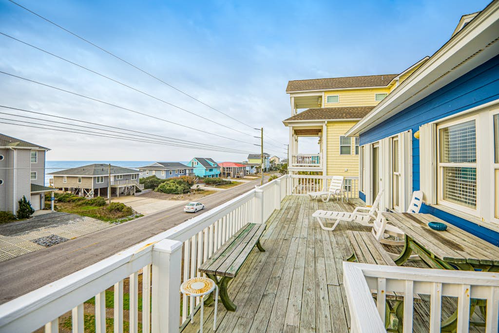 Second-row beach home with ocean views & outdoor shower - dog-friendly