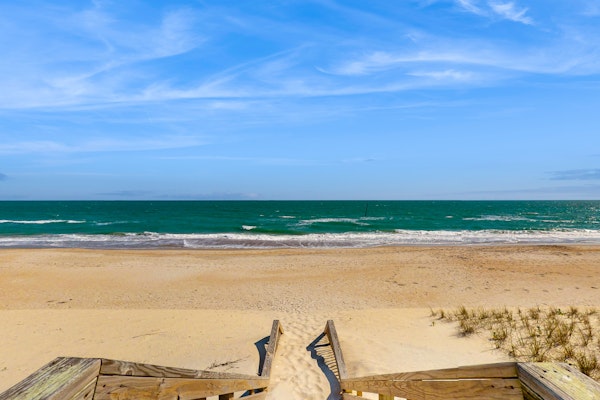 Dog-friendly beachfront home with ocean views, beach access, waterfront deck