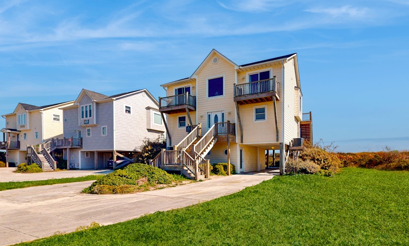 Dog-friendly beachfront home with ocean views, beach access, waterfront deck