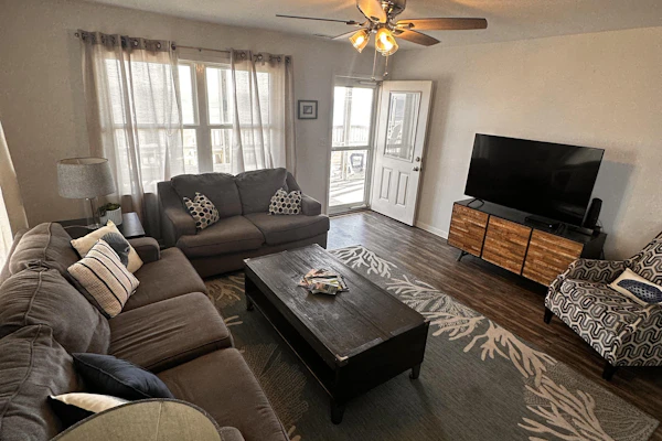 Beachfront dog-friendly home with ocean views, beach access, and outdoor shower