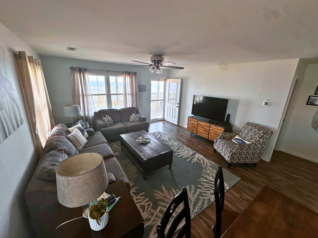 Beachfront dog-friendly home with ocean views, beach access, and outdoor shower