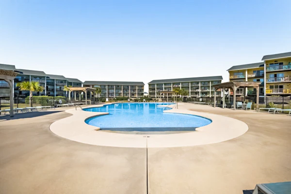 2nd-floor ocean-view condo with private beach access, community pool, gazebo