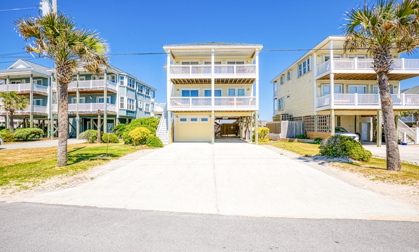 Multi-level beachfront home with private heated pool, elevator, beach access, AC