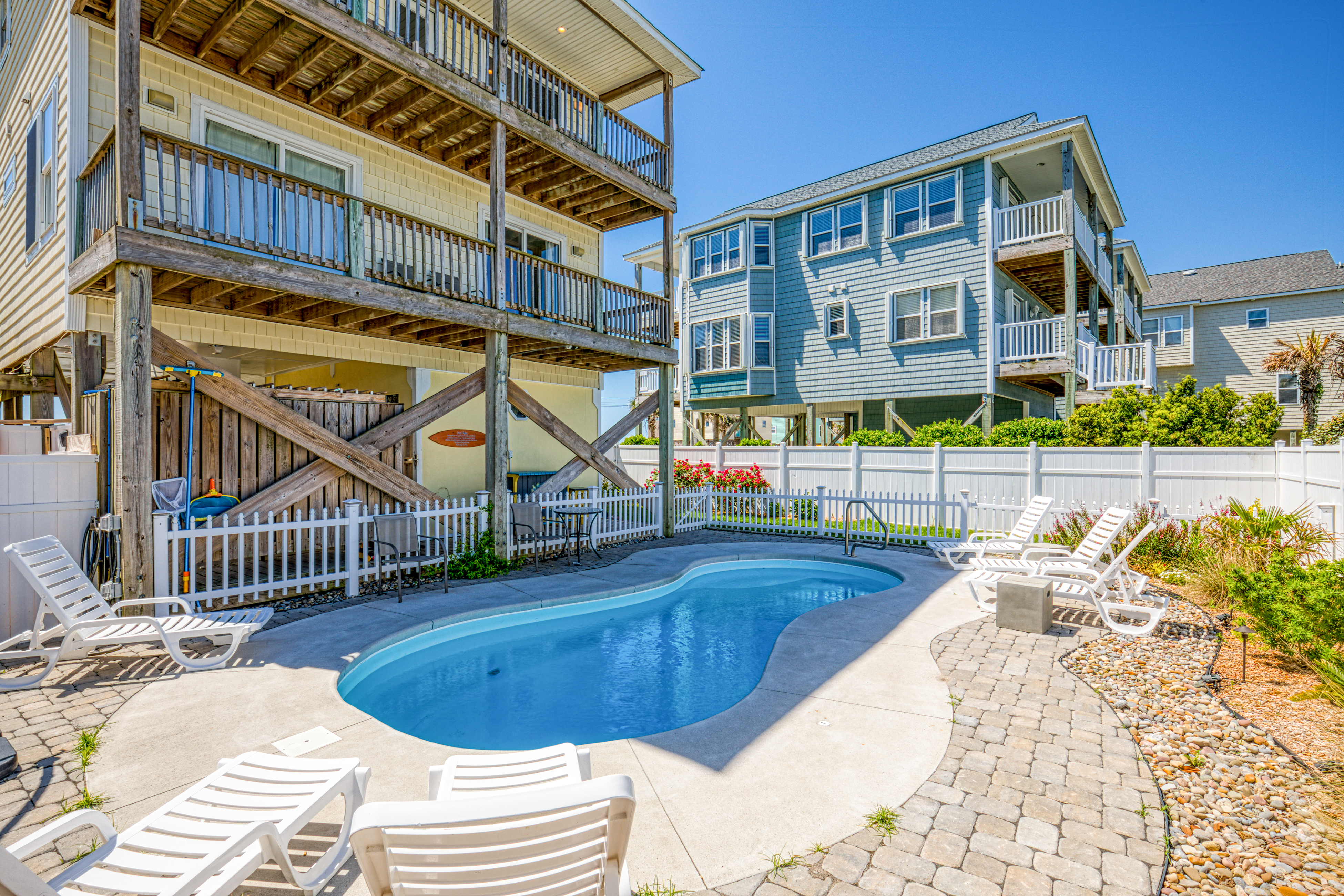 Multi-level beachfront home with private heated pool, elevator, beach access, AC