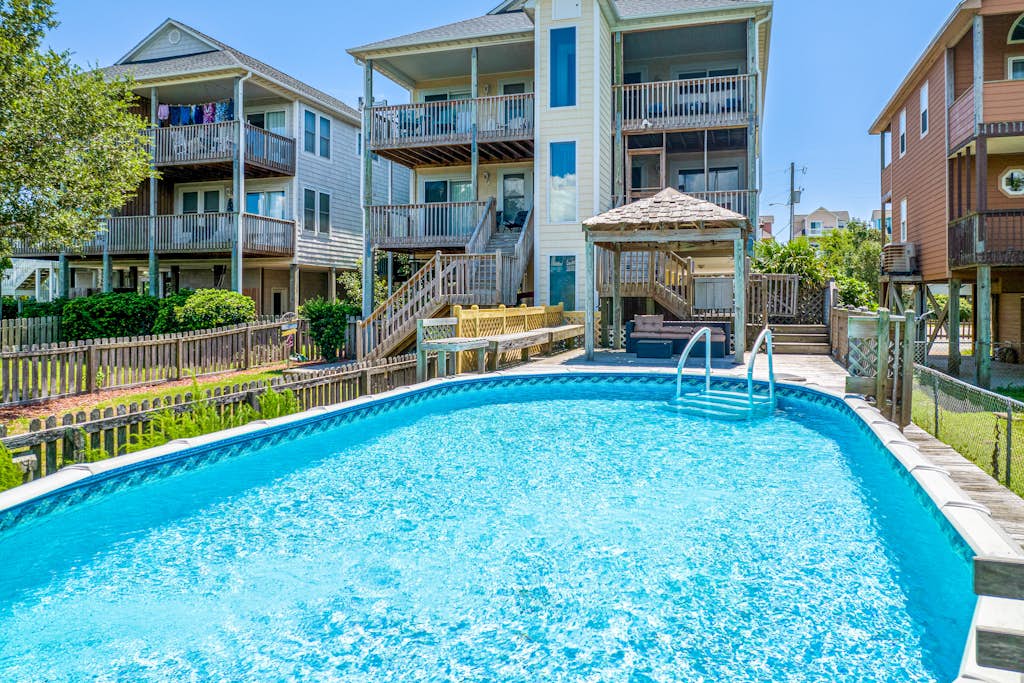 Waterfront duplex with private outdoor pool, enclosed yard, gazebo, sound views