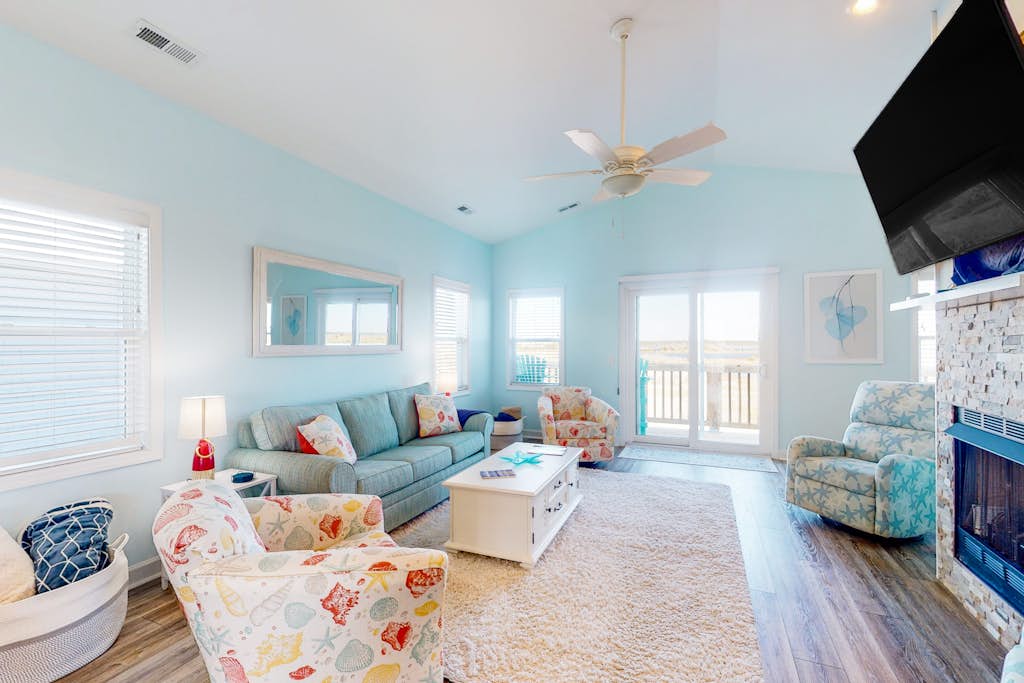 Dog-friendly, water-view home with scenic balcony, grill, washer/dryer & AC