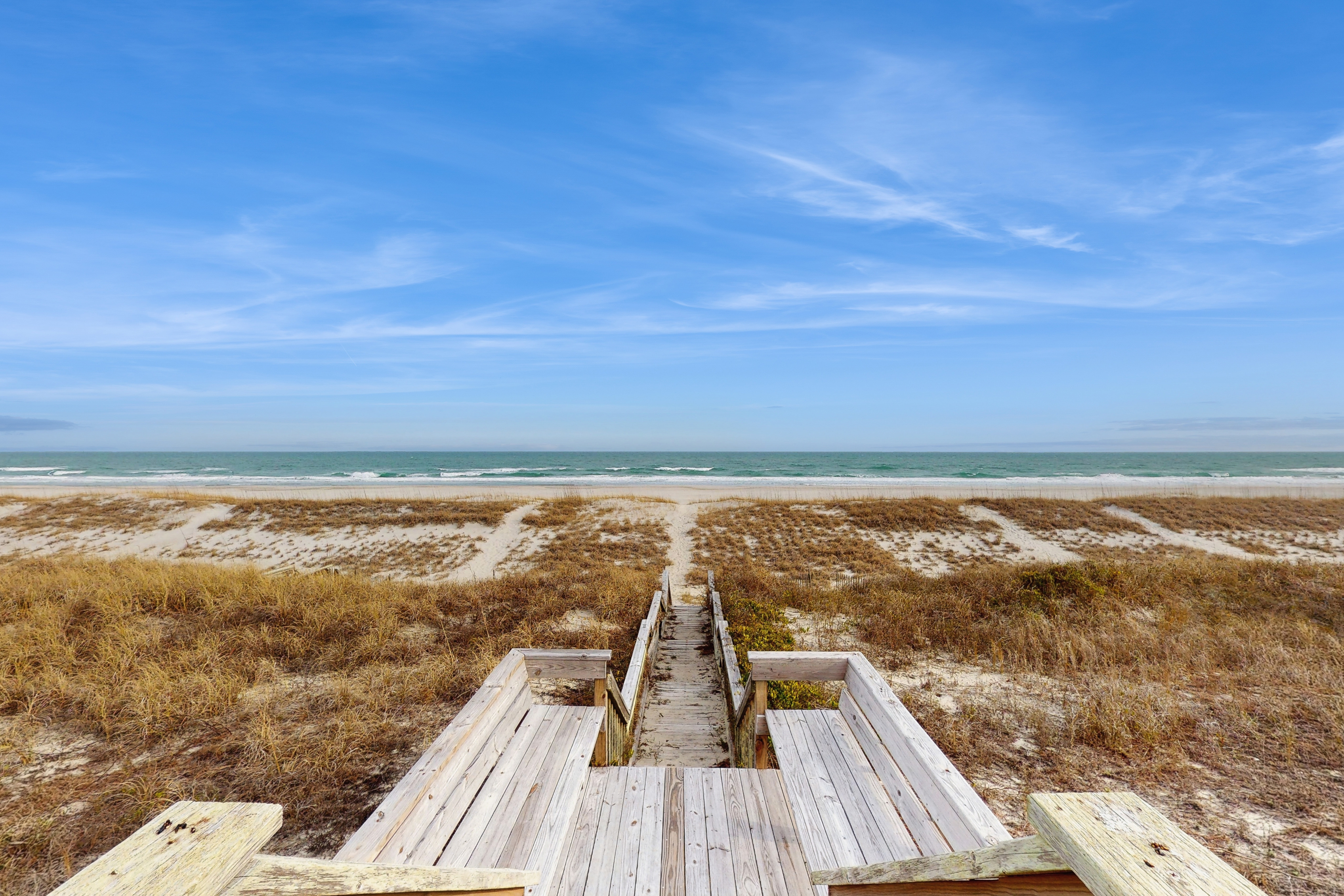 Oceanfront home with direct beach access and partial marsh views