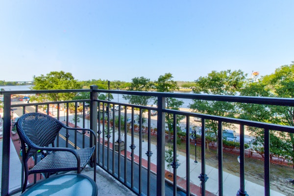 Downtown condo w/balcony view of Cape Fear River & Battleship North Carolina