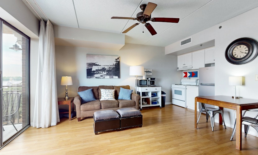 2 historic district condos with river-view balconies & highly walkable locale