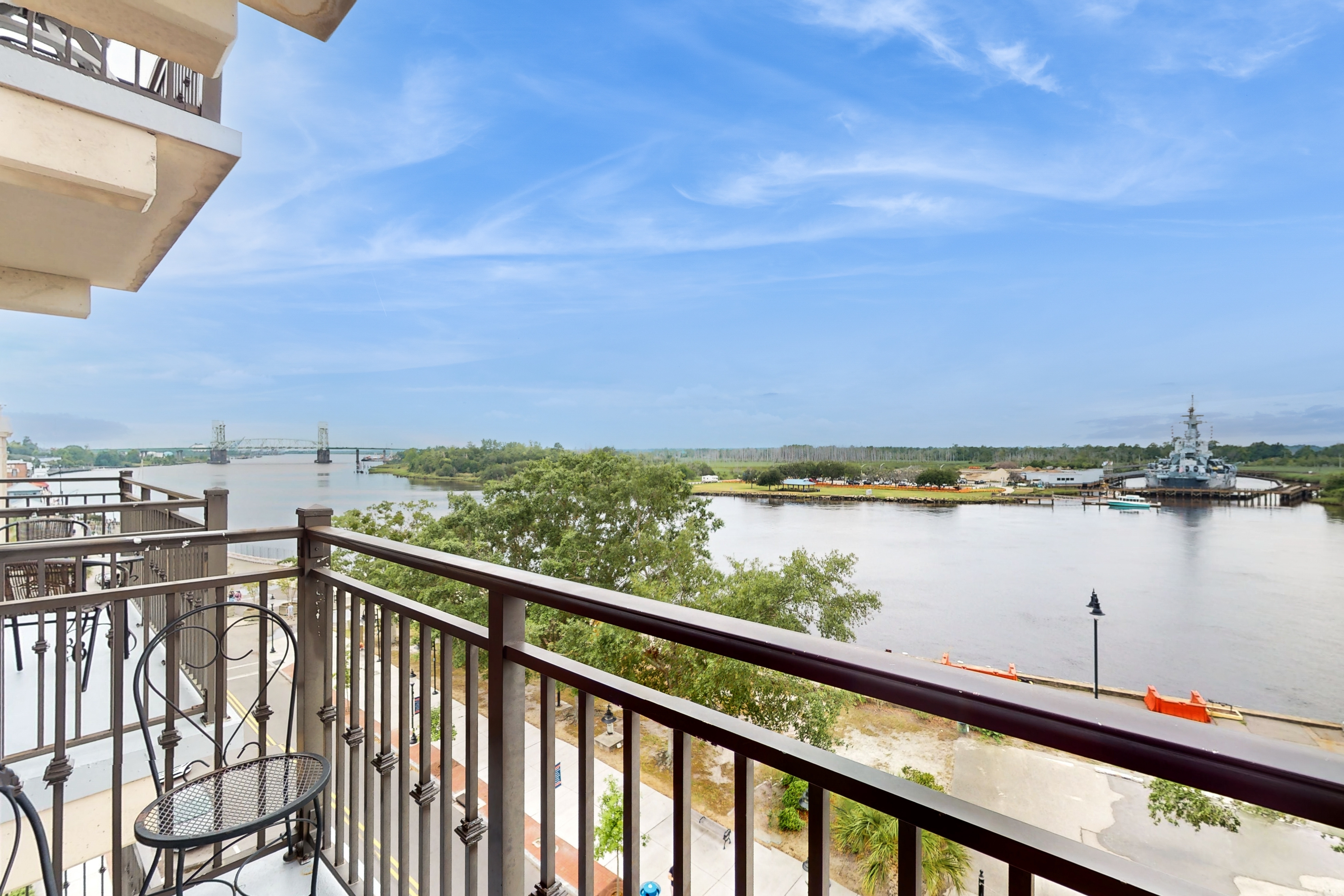 2 historic district condos with river-view balconies & highly walkable locale