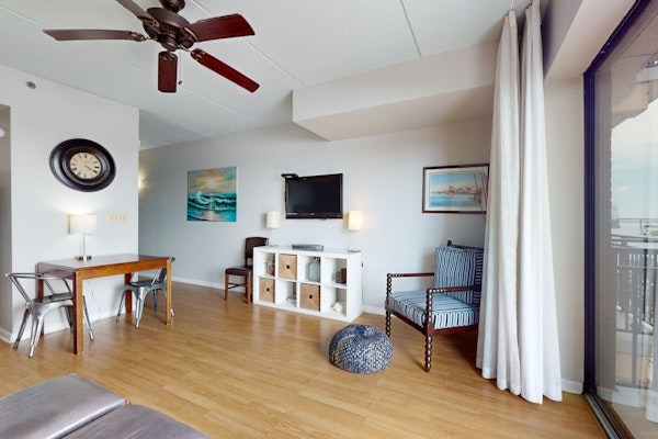 2 historic district condos with river-view balconies & highly walkable locale