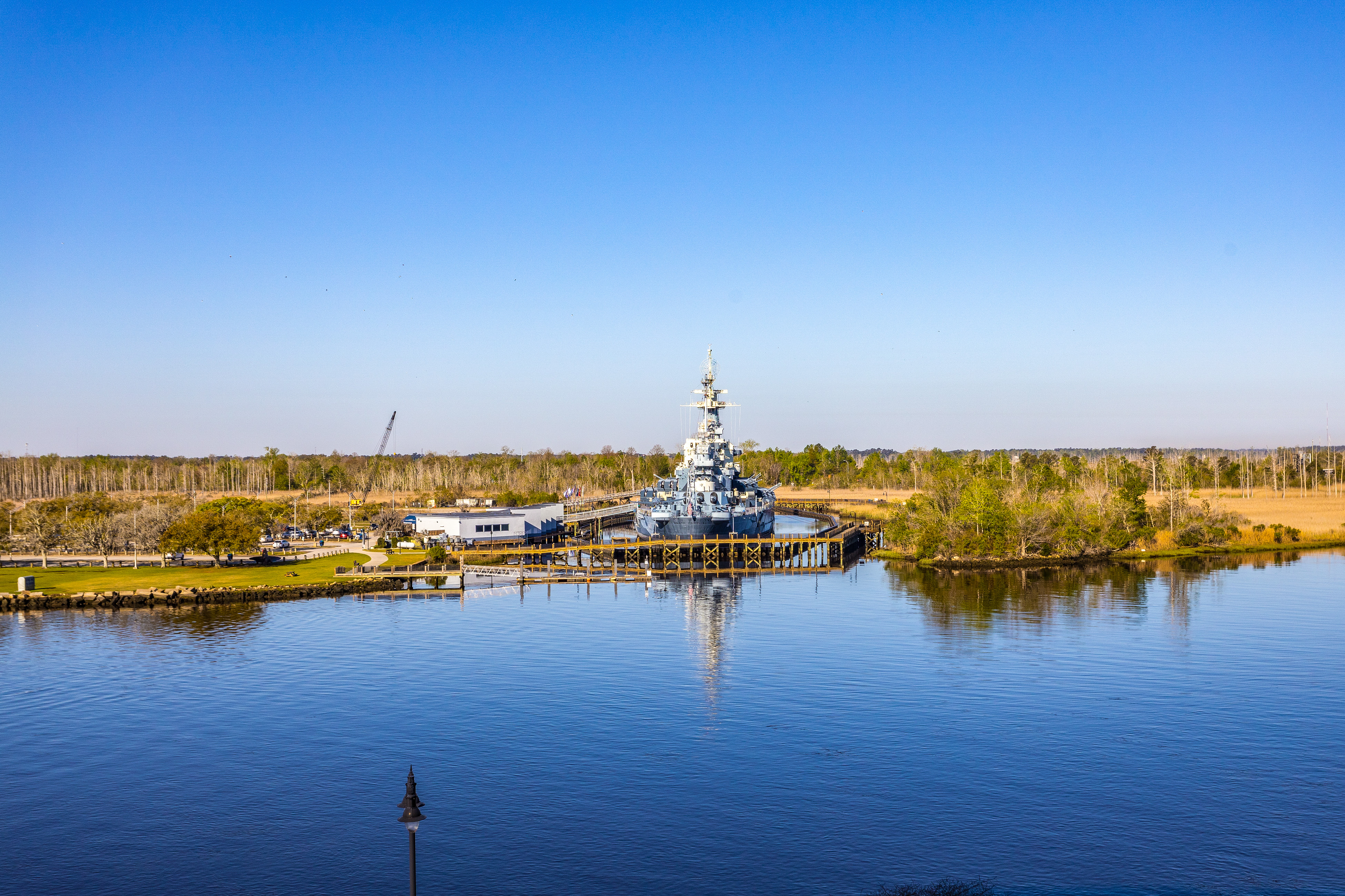 Waterfront Historic District suite with river-view balcony & walkable locale