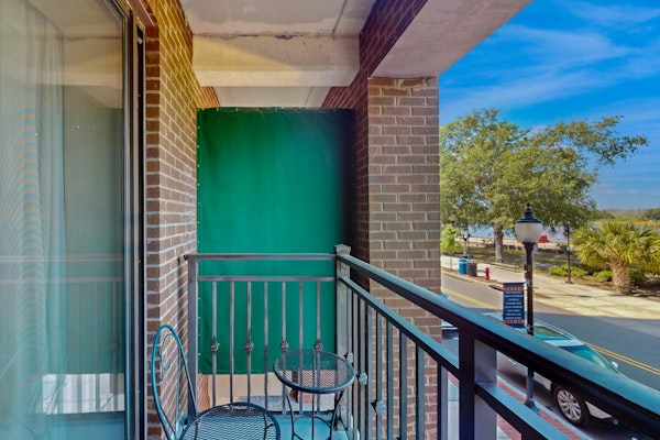 Condo w/ Private Balcony & Lovely River Views in Walkable Locale