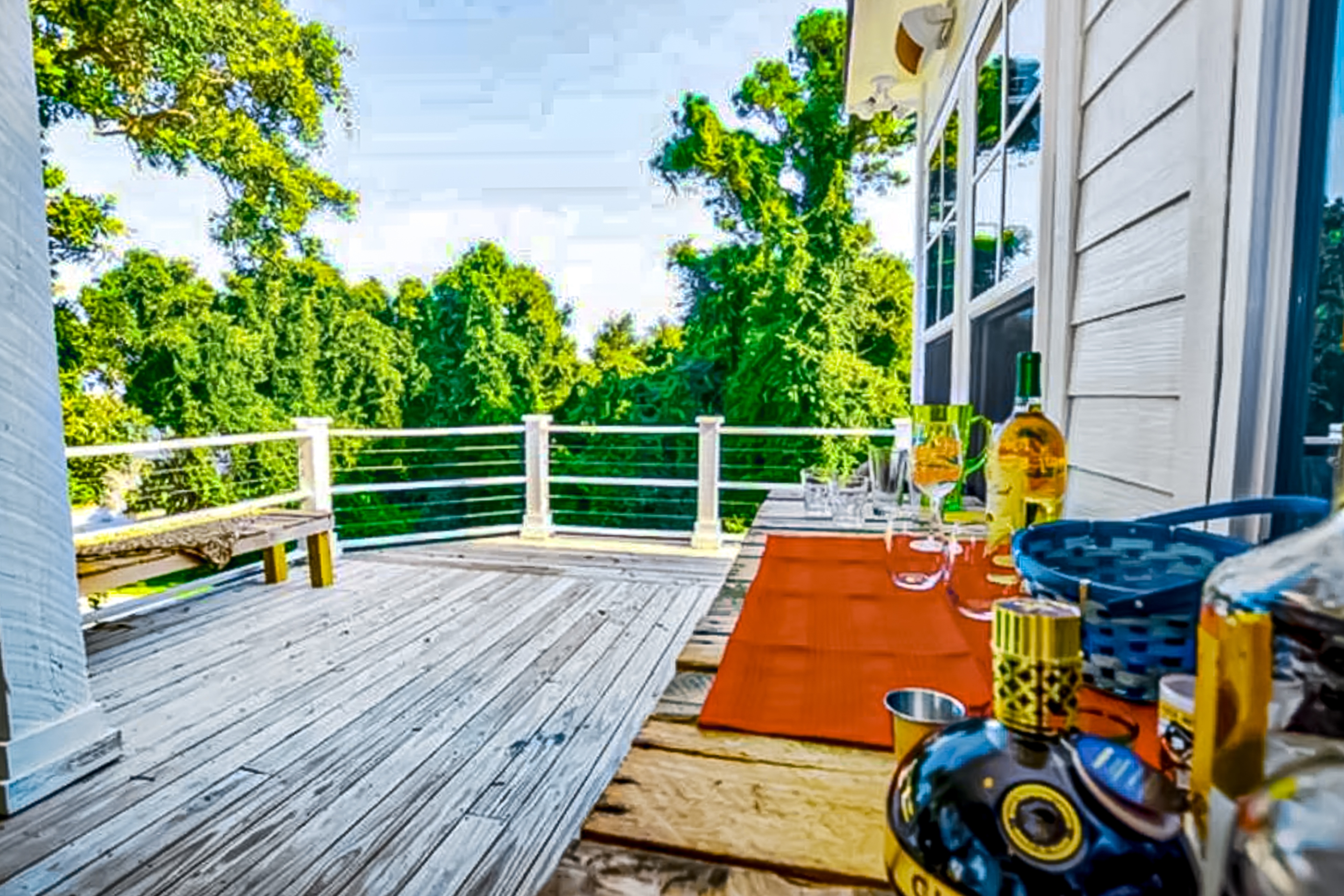 Spacious home near the coast with outdoor shower, balconies, dock access, & AC