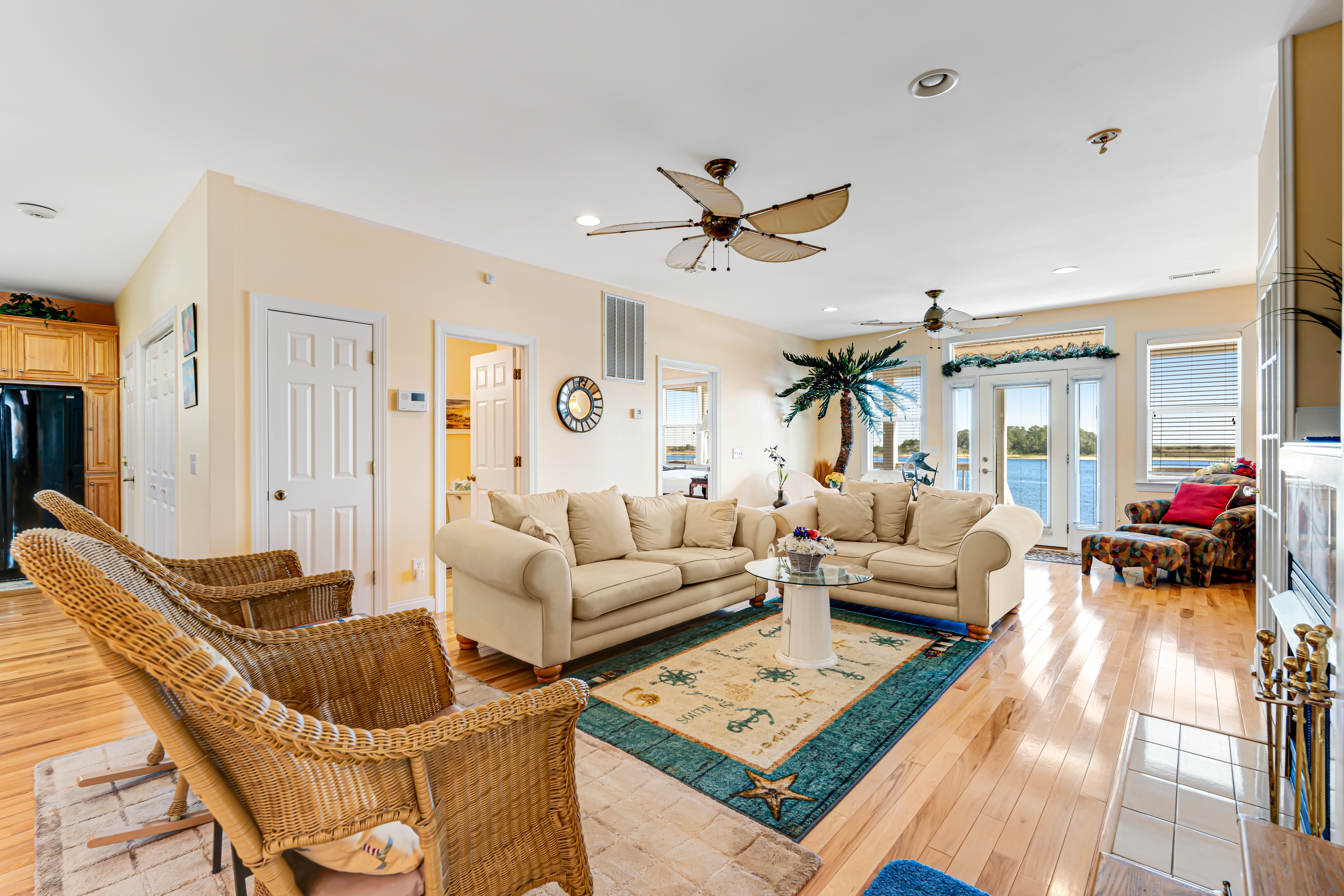 Waterfront charmer with expansive outdoor space, full kitchen, W/D, & central AC