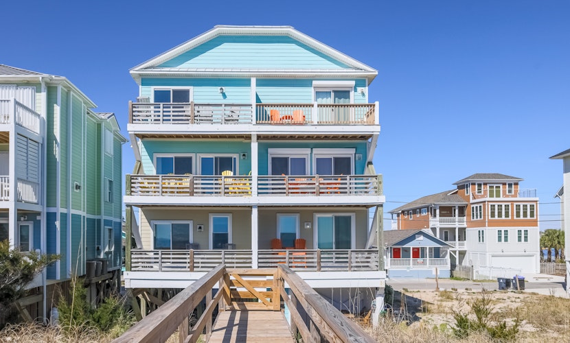 Elegant beachfront escape with private boardwalk, free WiFi, & furnished balcony