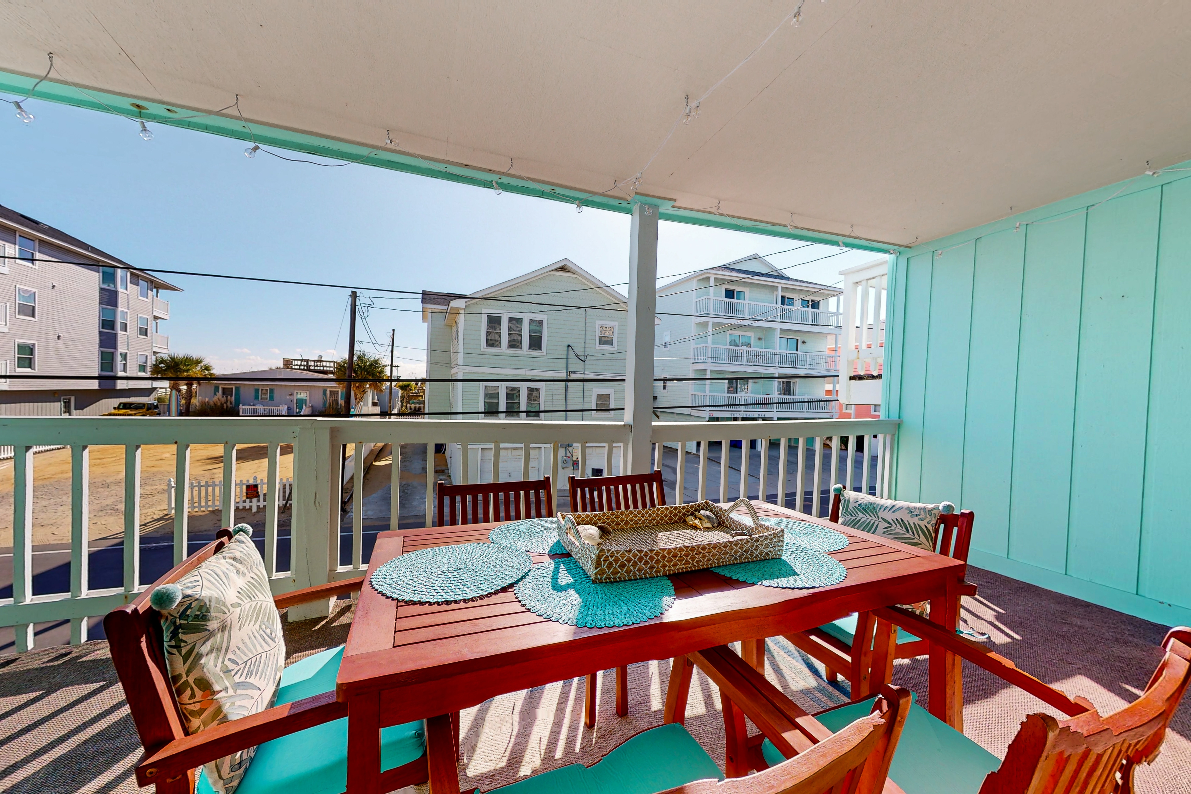 Dog-friendly condo near the beach with pool, covered balcony, streaming, & W/D