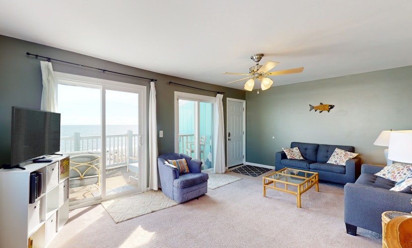 Oceanfront condo with furnished balcony, washer/dryer, & central AC