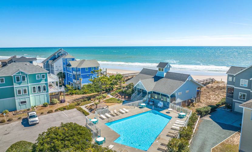 2-story home near the beach with beach access, deck, community pool & tennis