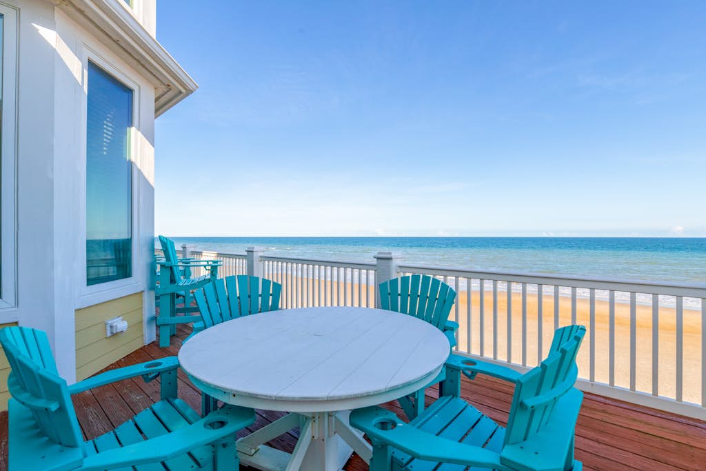 Oceanfront, multi-level home with beach access, views, game room, & elevator