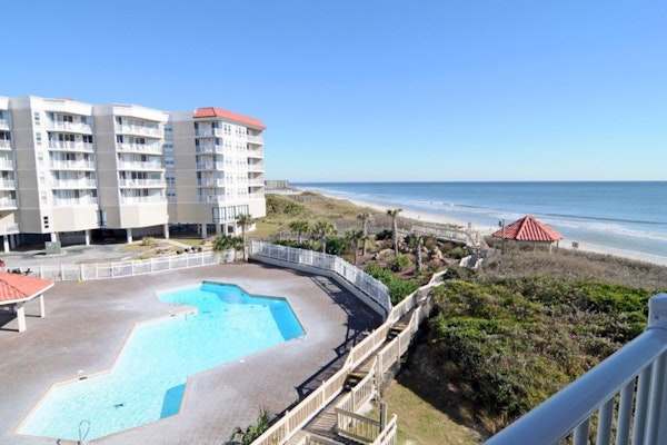 Oceanfront condo with ocean-view balconies, gym, pool & beach access