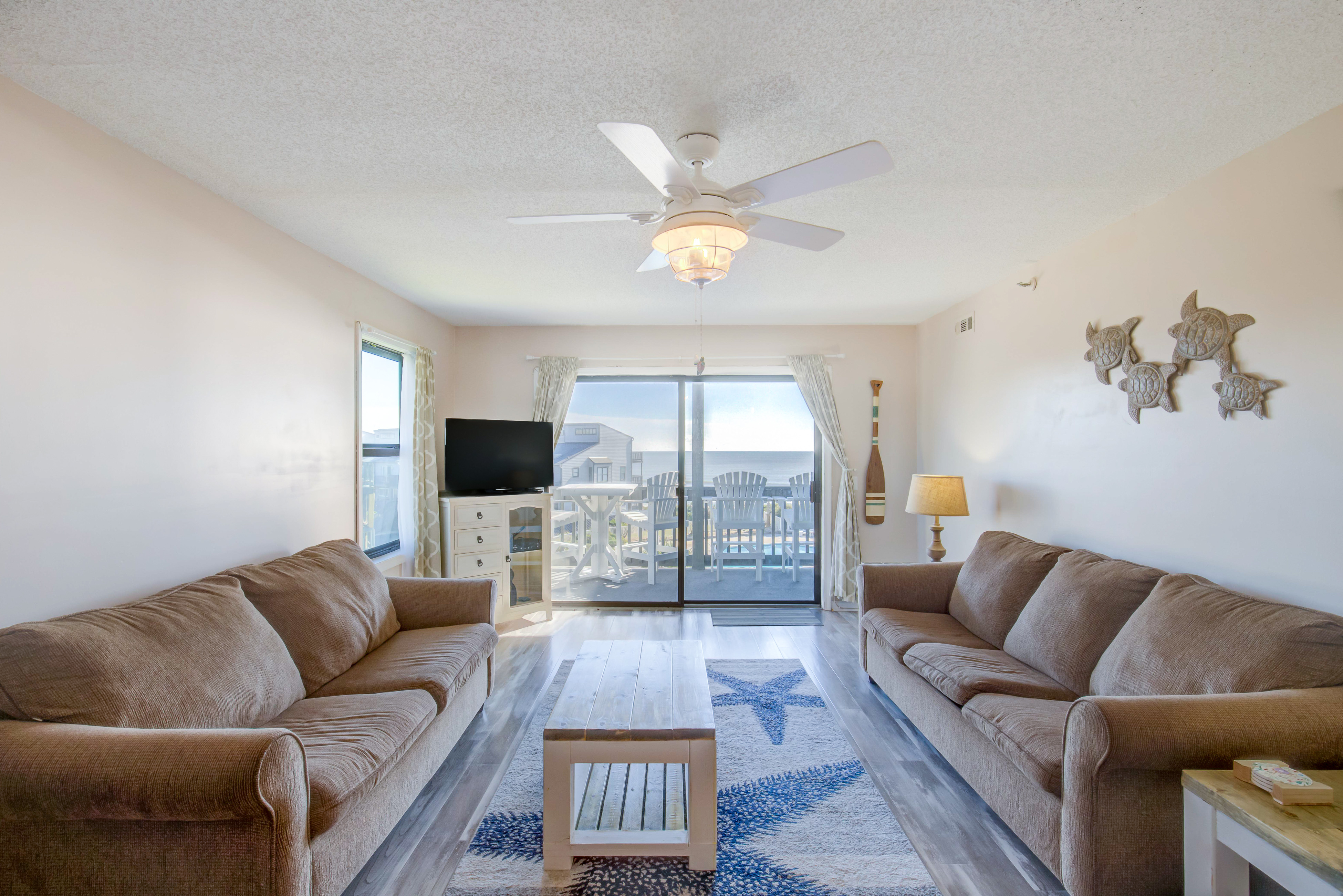 Oceanfront condo with elevator, private beach, ocean view, community pool, grill