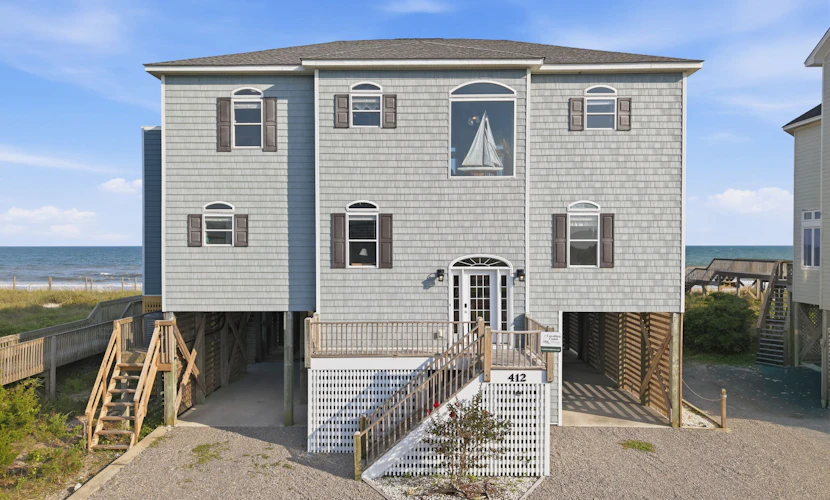 Oceanfront home with direct beach access, community pool & private hot tub