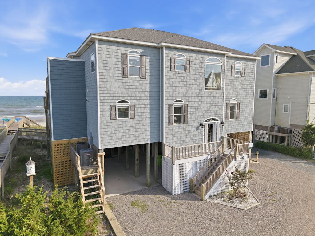 Oceanfront home with direct beach access, community pool & private hot tub