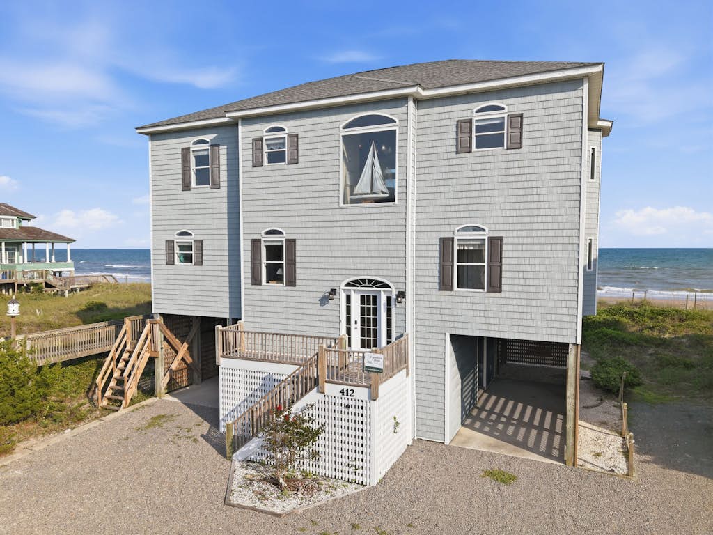 Oceanfront home with direct beach access, community pool & private hot tub