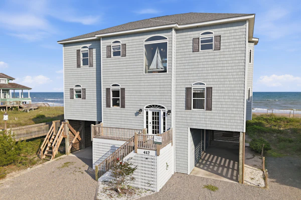Oceanfront home with direct beach access, community pool & private hot tub