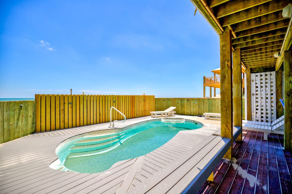 Beachfront home with private heated pool & hot tub, elevator, and beach access