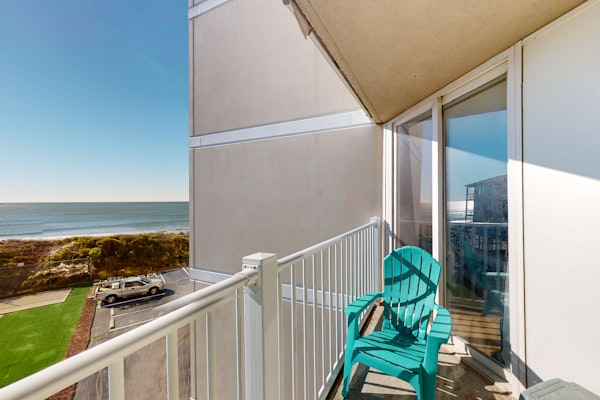 St. Regis beach condo with ocean-view balcony, pool, gym & restaurant