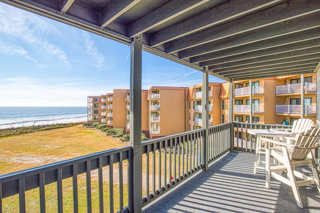 Wonderful beachfront condo with beach views, elevator, community pool & grills