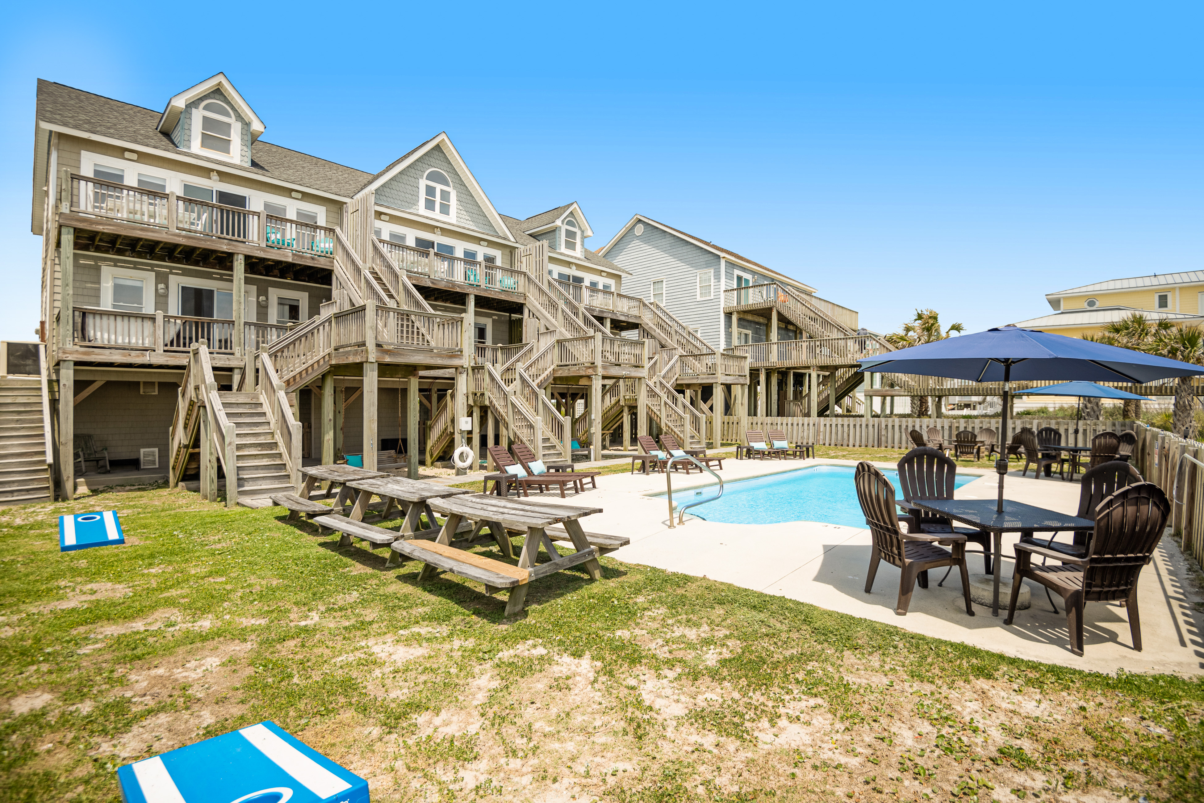 Sunshine- Oceanfront townhome with beach access, a pool, hot tub, & AC