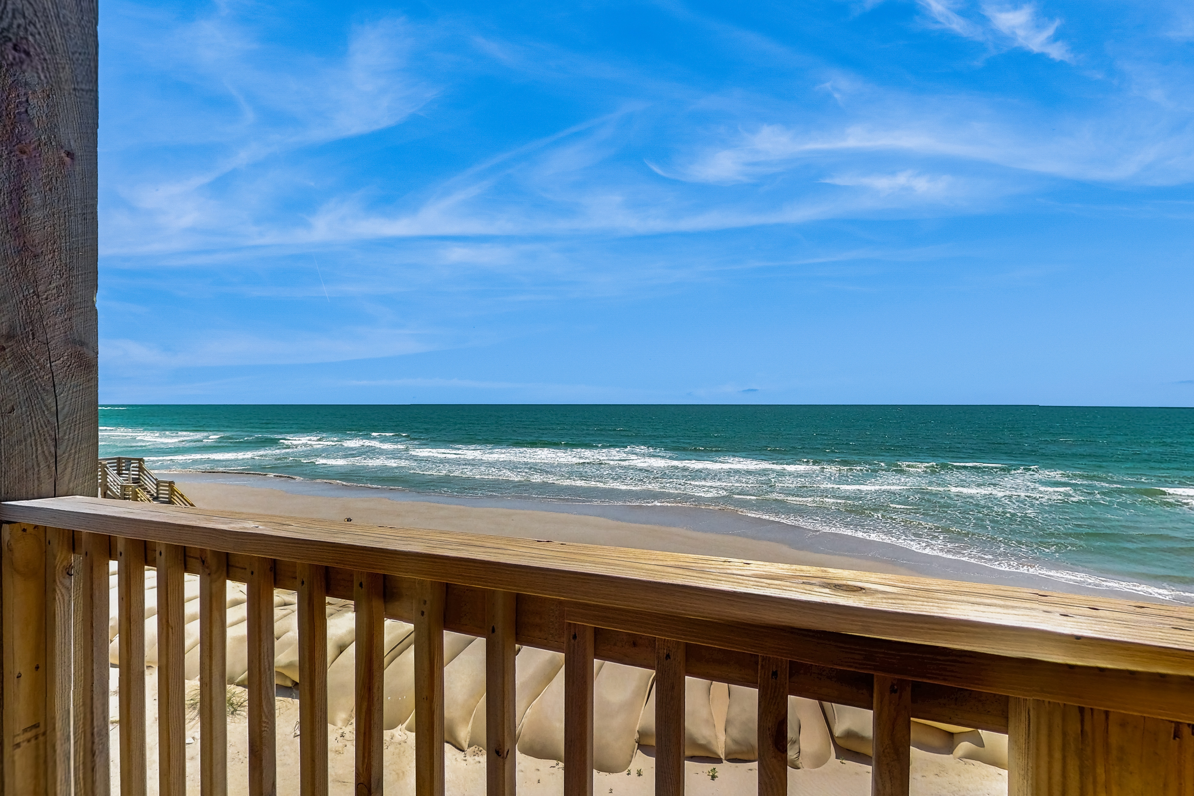 Oceanfront condo w/ kitchenette, TV, washer/dryer, and balcony