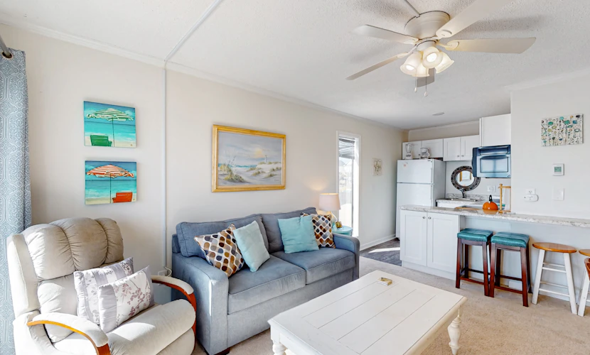 Cheerful beachfront condo with balcony, tennis court, & W/D - snowbird-friendly