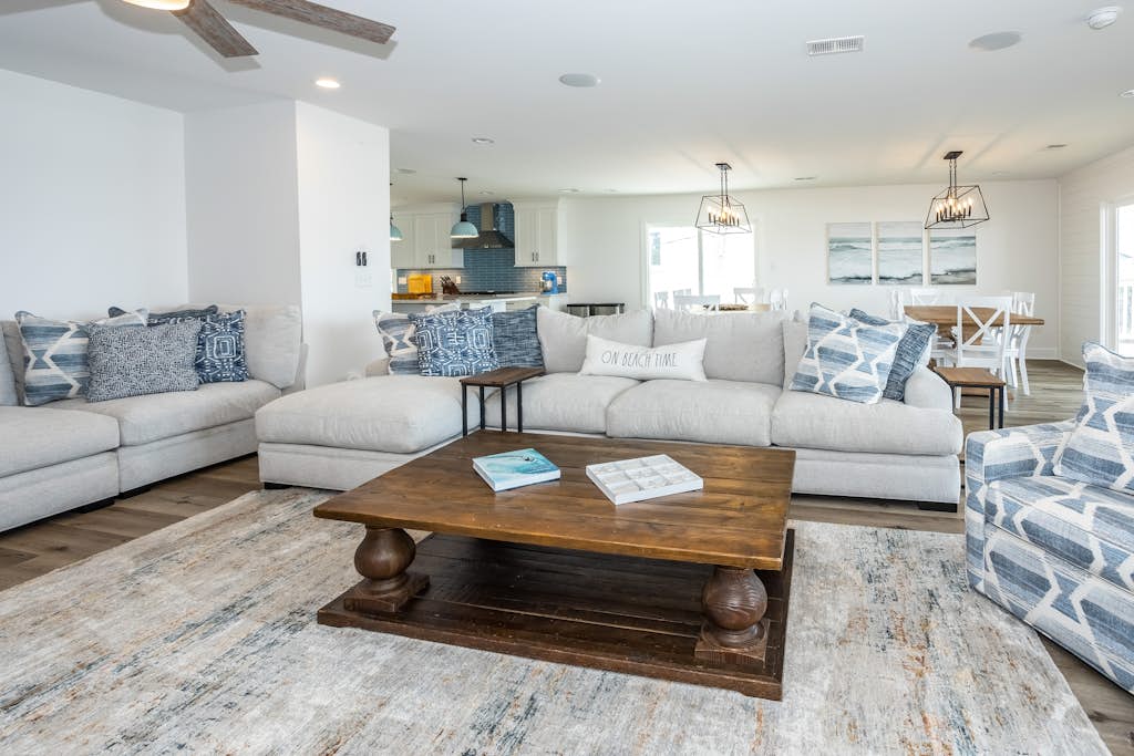 Renovated ocean-view home with beachfront access, hot tub, pool table, & deck