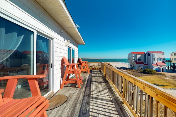 Secluded, updated, dog-friendly beach house with 360-water views, balconies & AC
