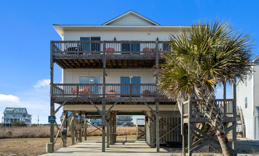 Secluded, updated, dog-friendly beach house with 360-water views, balconies & AC