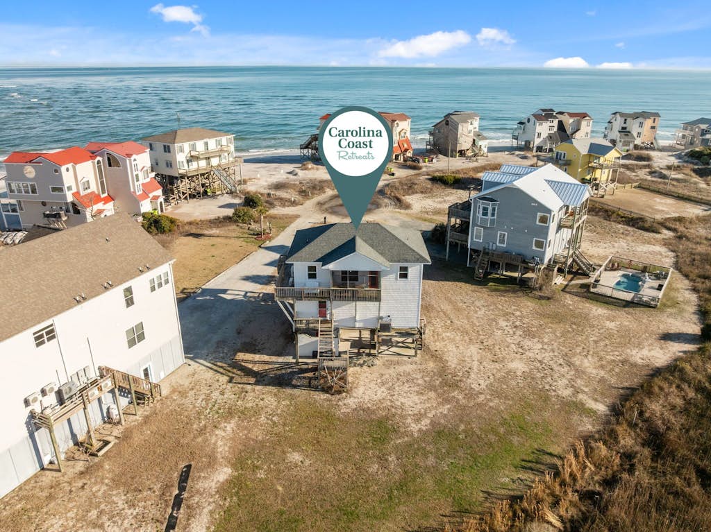 Secluded, updated, dog-friendly beach house with 360-water views, balconies & AC
