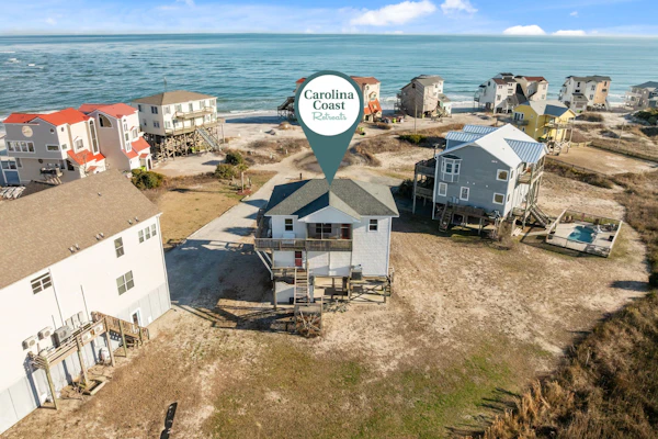 Secluded, updated, dog-friendly beach house with 360-water views, balconies & AC