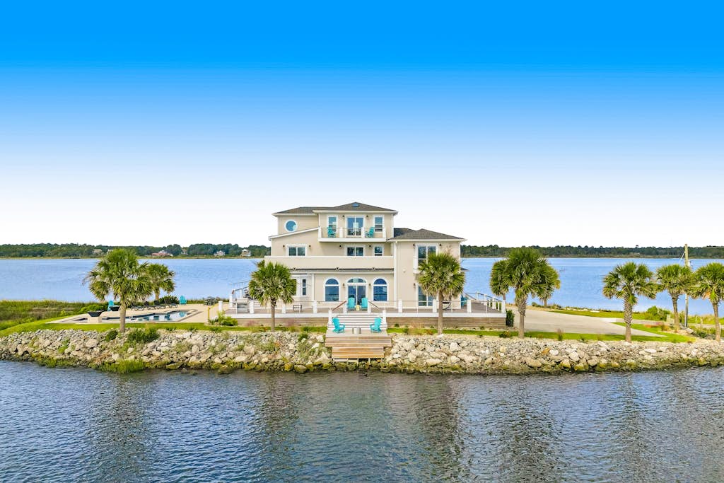 Sneads Island: Luxurious private island home with pool, wraparound deck, & firepit