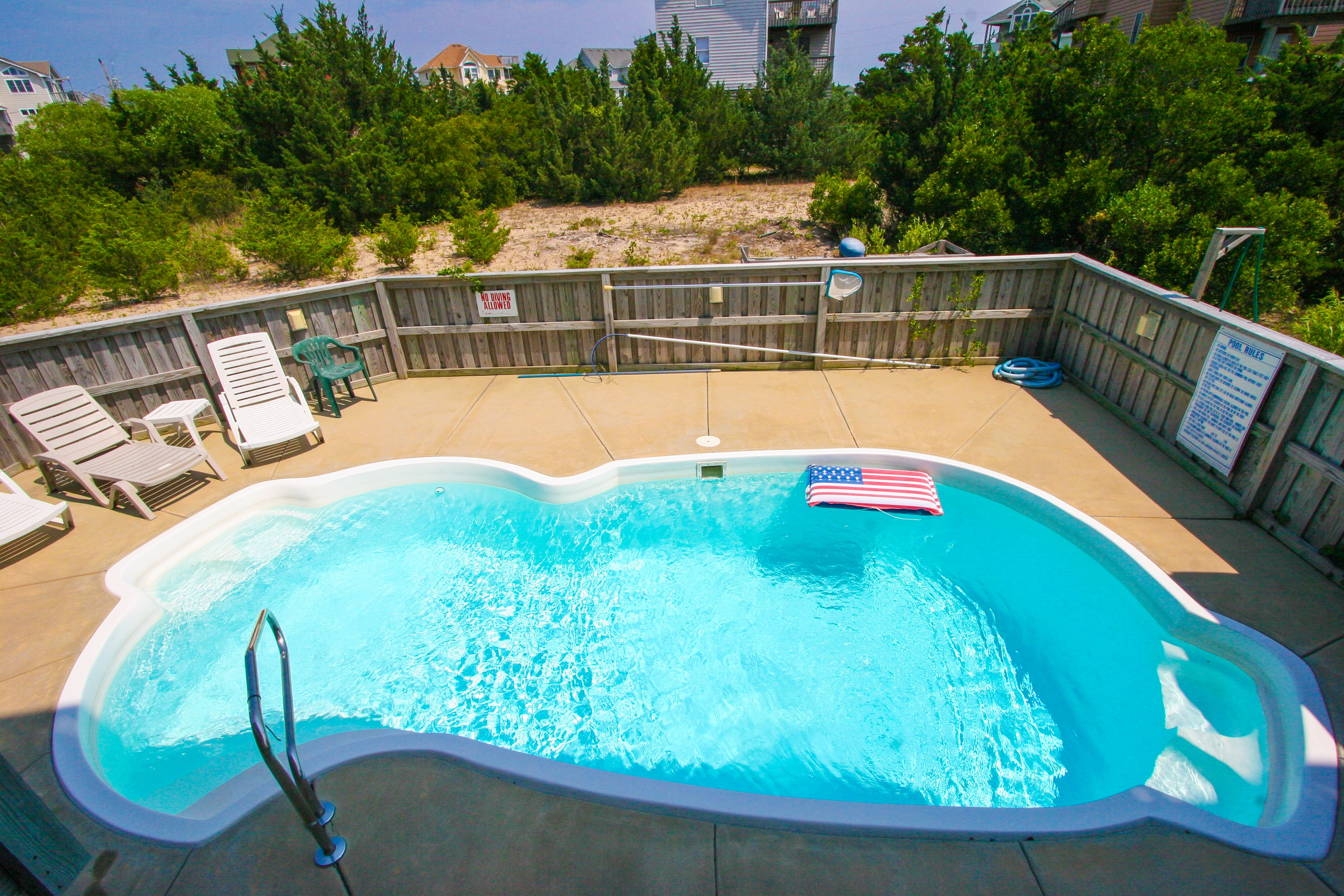 Dog-friendly home with private pool, hot tub, foosball, & AC - walk to beach