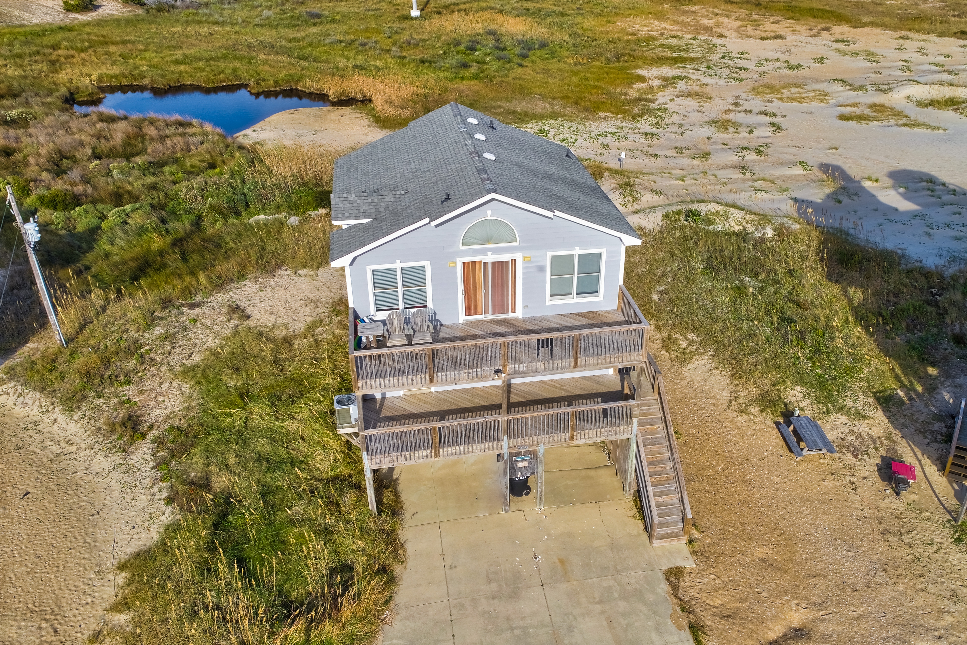 Stunning dog-friendly coastal escape with decks, beach access, & amazing views