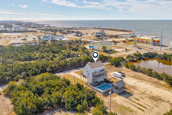 3-story dog-friendly home near the beach with private hot tub, pool, & ocean views